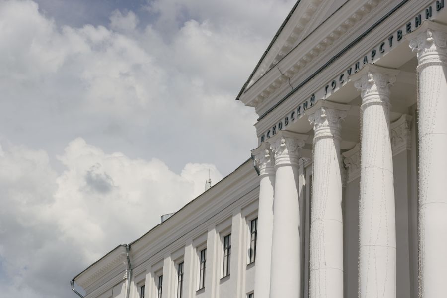Classical columned facade, conveying structured and enduring foundations